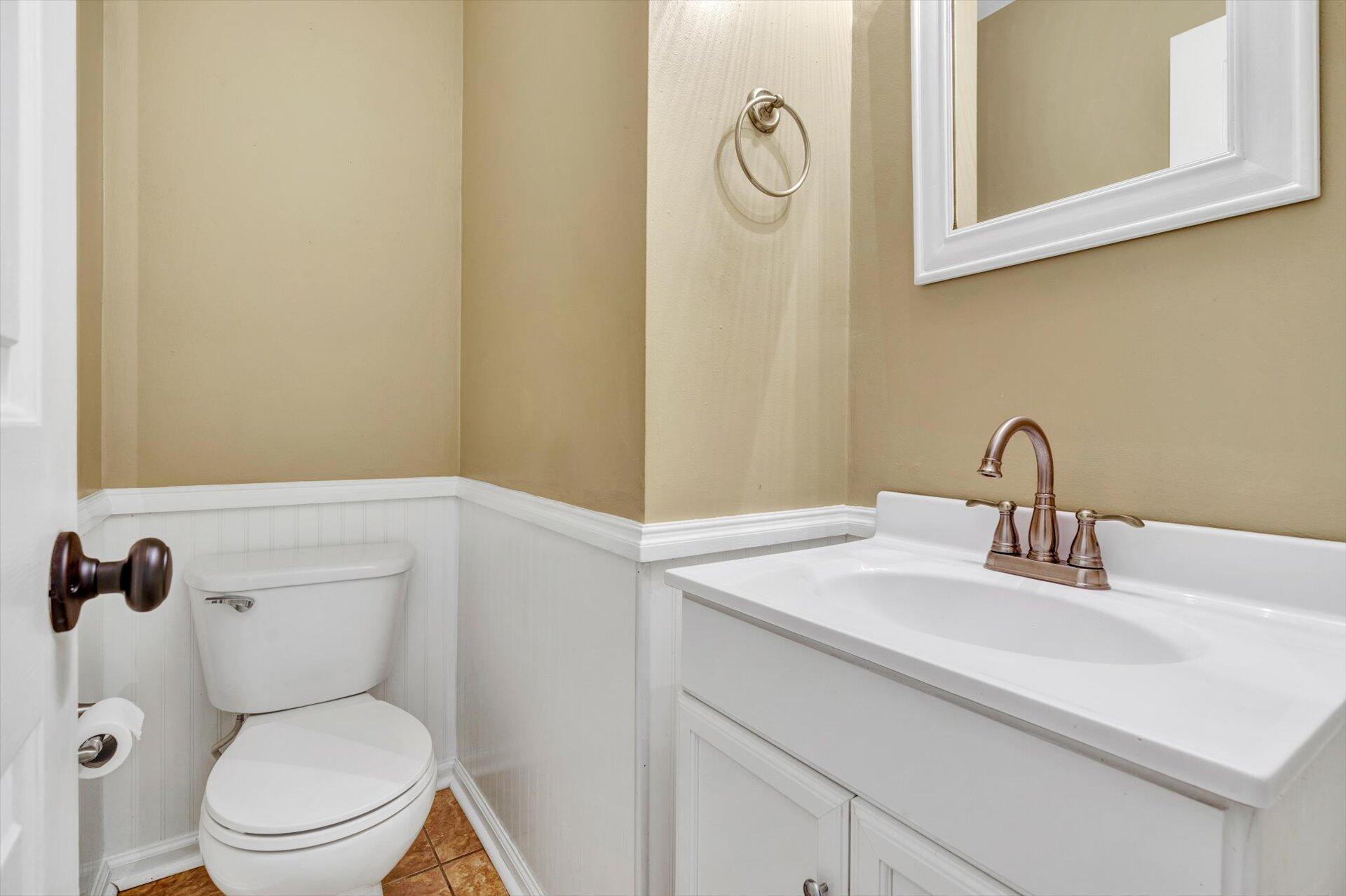 2910 Tree Swallow Road Roanoke, VA 24018 - Photo 8 of 36 a bathroom with a sink a toilet and mirror