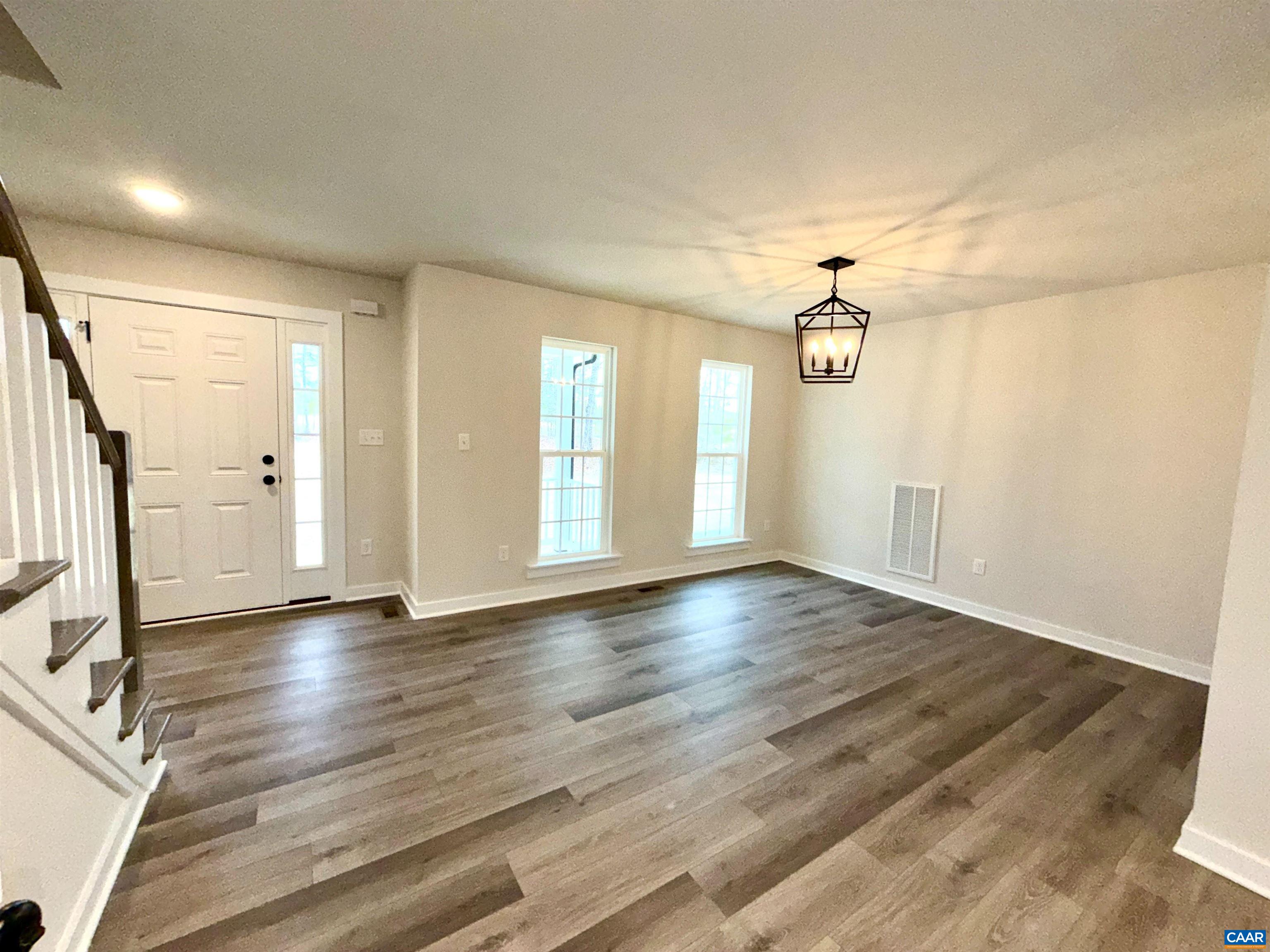 3546 Courthouse Road, Unit CBE4 Palmyra, VA 22963 - Photo 8 of 19 wooden floor in an empty room with a window