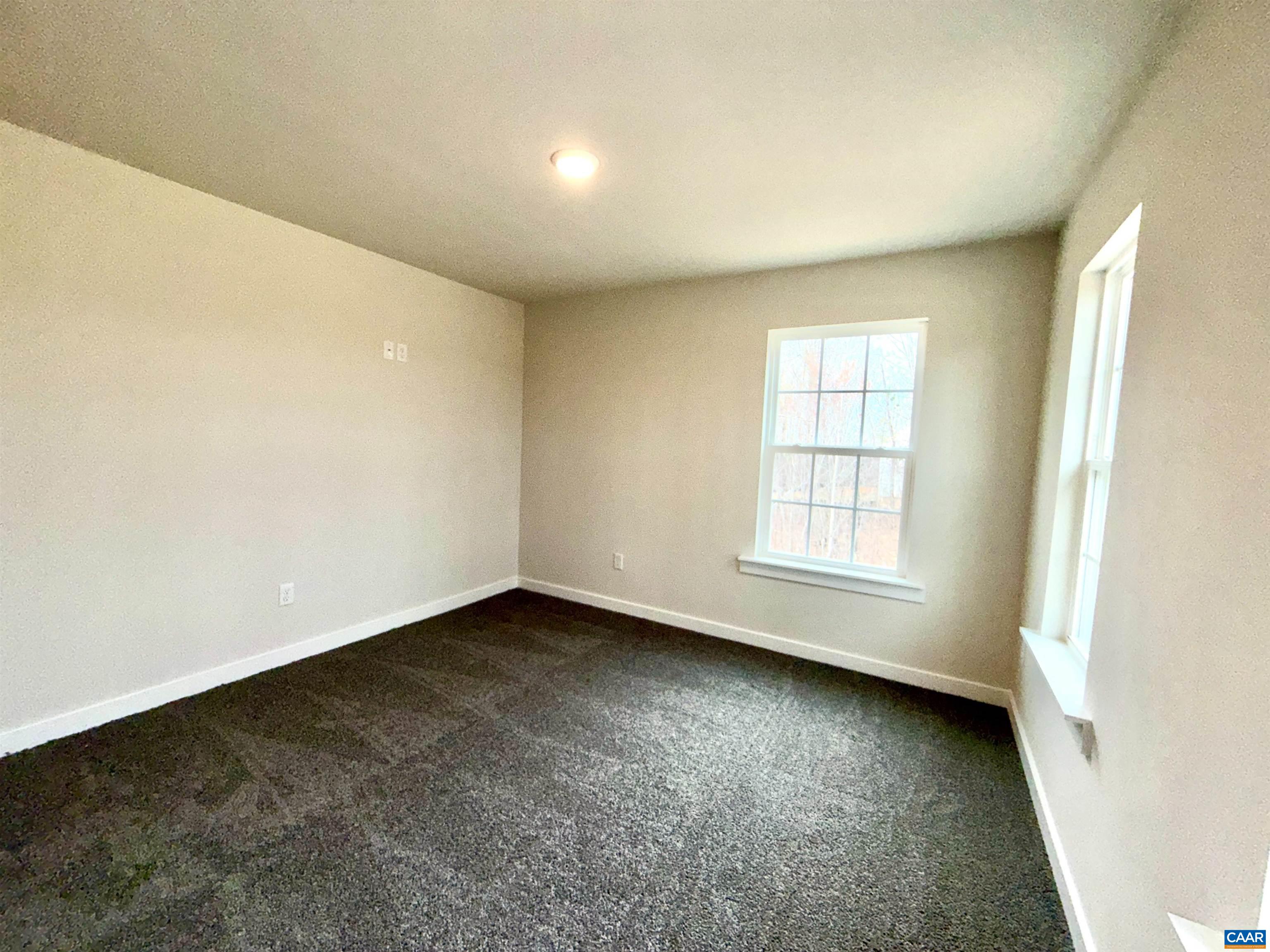 3546 Courthouse Road, Unit CBE4 Palmyra, VA 22963 - Photo 9 of 19 an empty room with a window