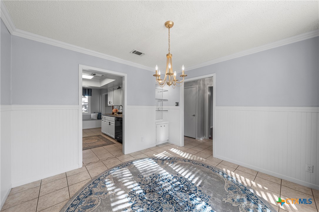 2014 Forest Trail Temple, TX 76502 - Photo 12 of 38 a view of a chandelier in a room and kitchen