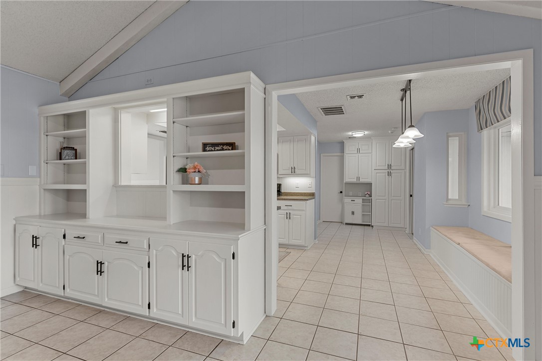 2014 Forest Trail Temple, TX 76502 - Photo 14 of 38 a view of a kitchen with white cabinets and wooden floor