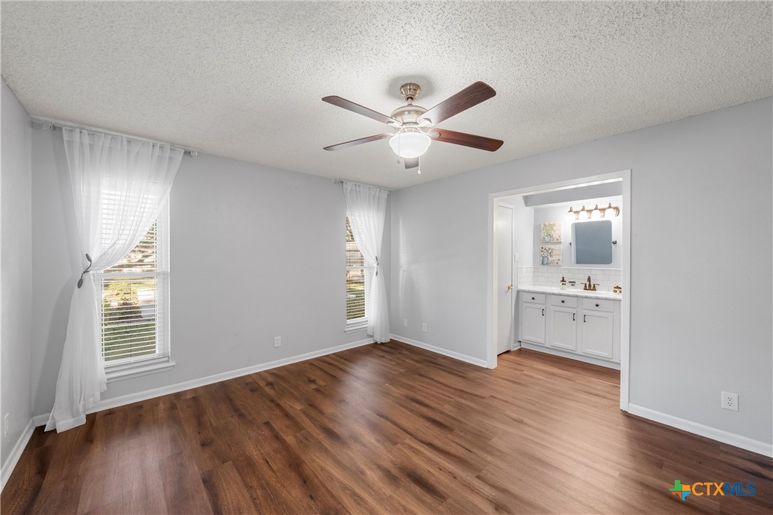 2014 Forest Trail Temple, TX 76502 - Photo 19 of 38 a view of an empty room with a window and wooden floor