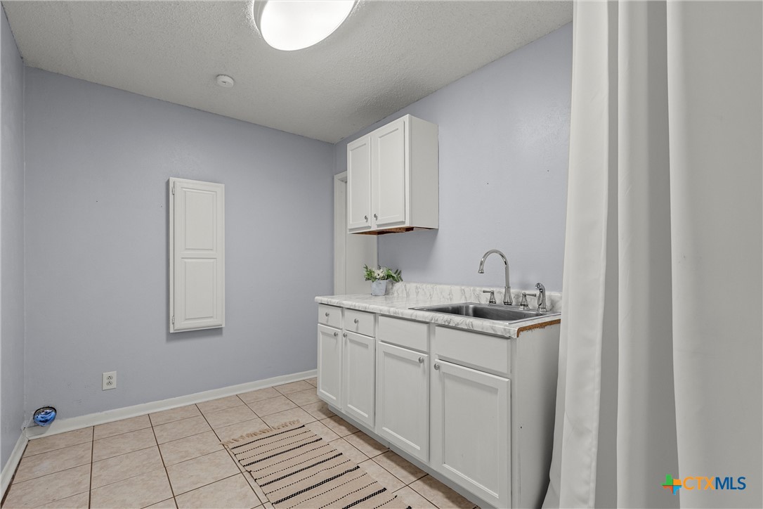 2014 Forest Trail Temple, TX 76502 - Photo 26 of 38 a view of cabinets with sink