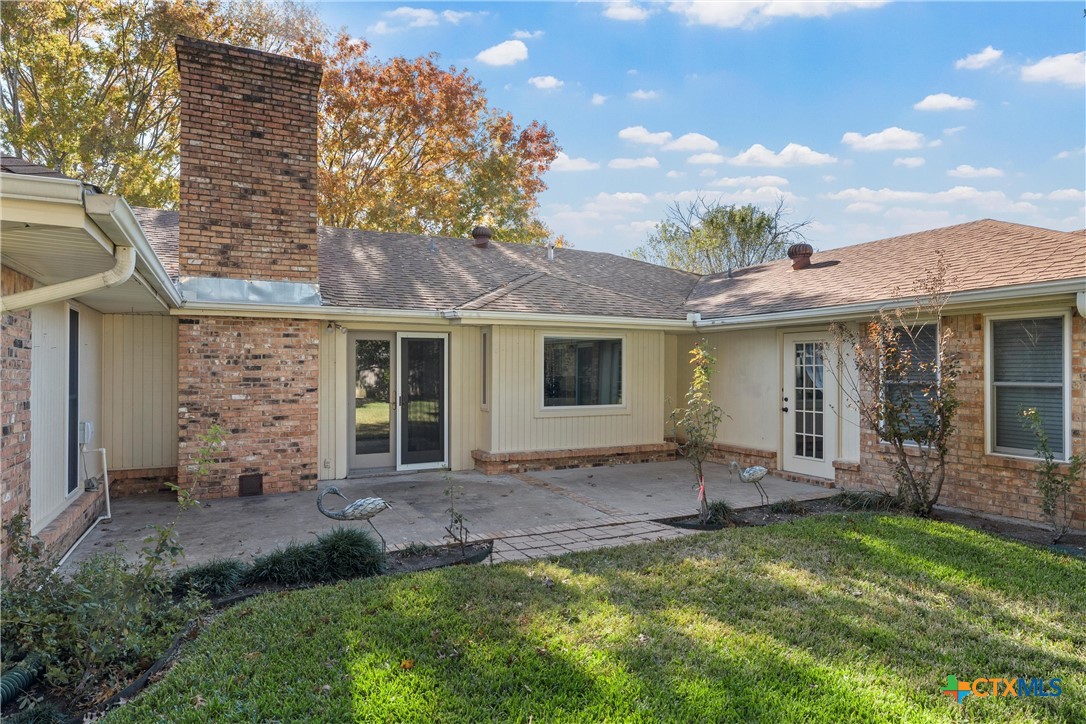 2014 Forest Trail Temple, TX 76502 - Photo 33 of 38 a view of a house with a backyard and a patio