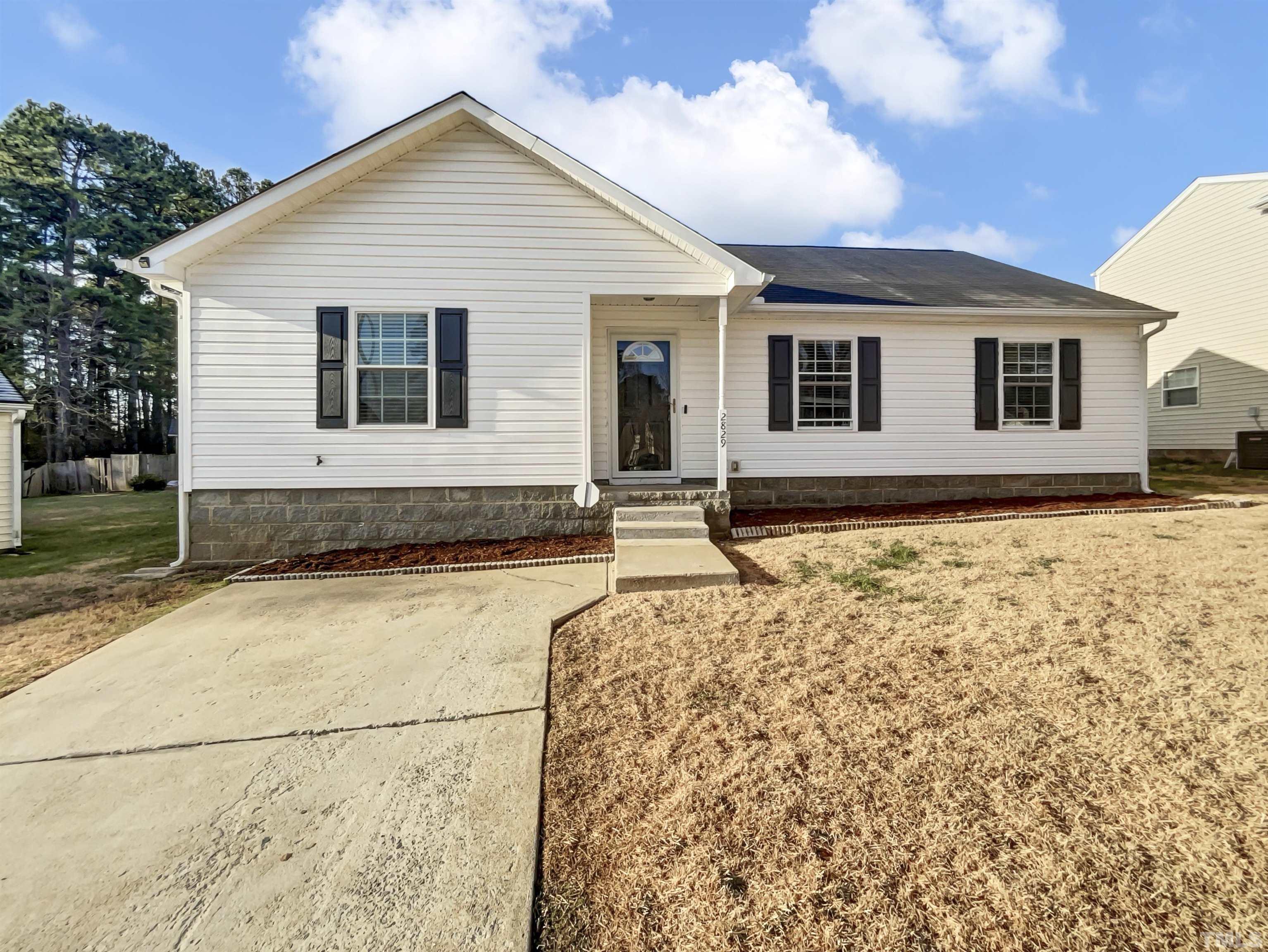 2829 Midway Park Court Raleigh, NC 27610 - Photo 1 of 16 a house view with a outdoor space