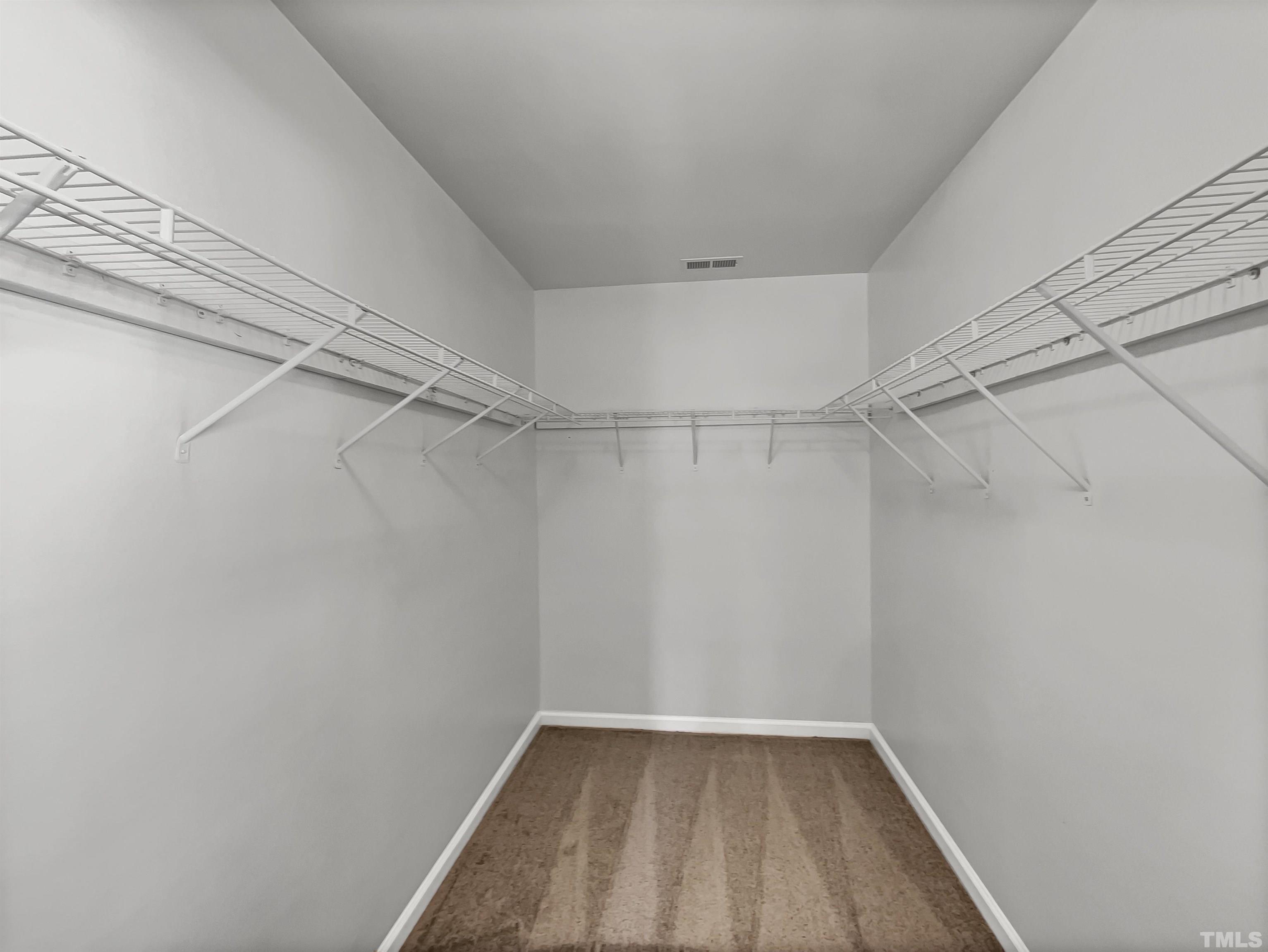 2829 Midway Park Court Raleigh, NC 27610 - Photo 15 of 16 a view of a room with racks on the wall