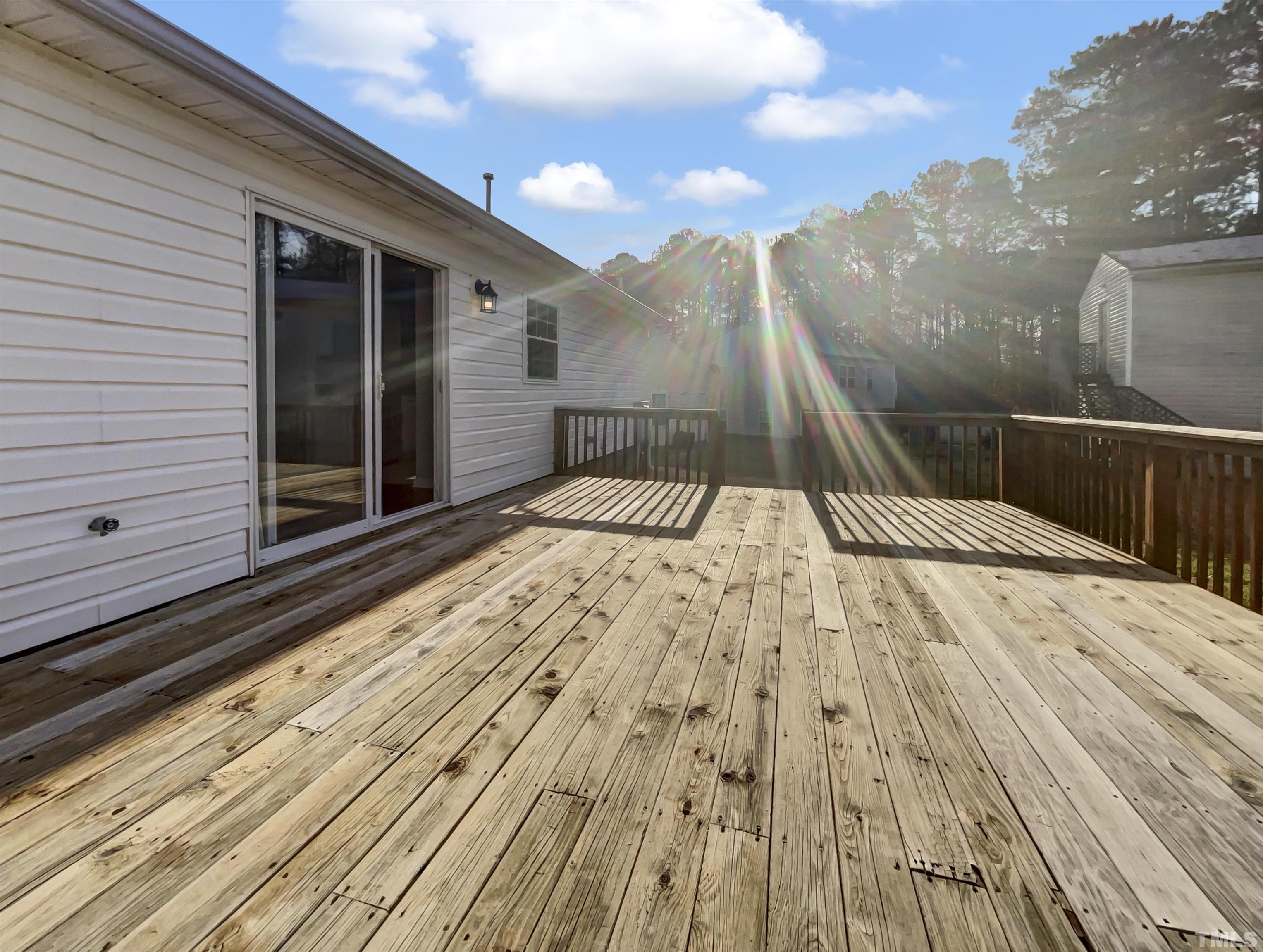 2829 Midway Park Court Raleigh, NC 27610 - Photo 16 of 16 a view of a backyard of the house