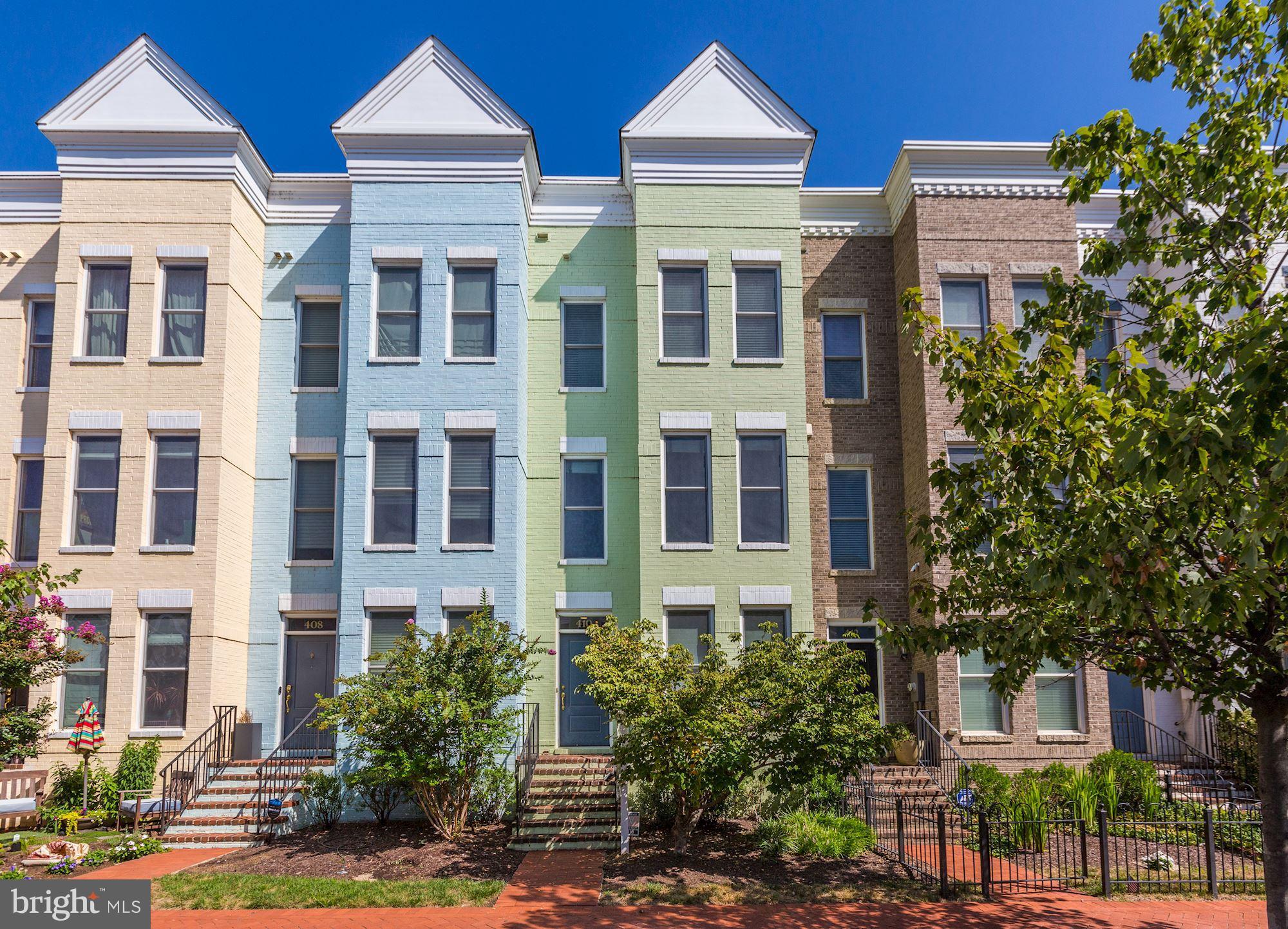 410 L Street Southeast Washington, DC 20003 - Photo 2 of 35 a view of a brick building next to a yard