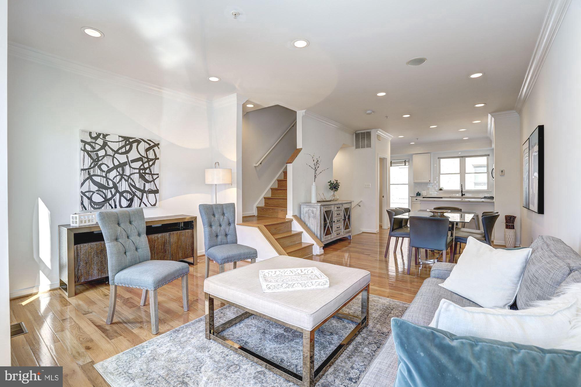 410 L Street Southeast Washington, DC 20003 - Photo 35 of 35 a living room with furniture and wooden floor