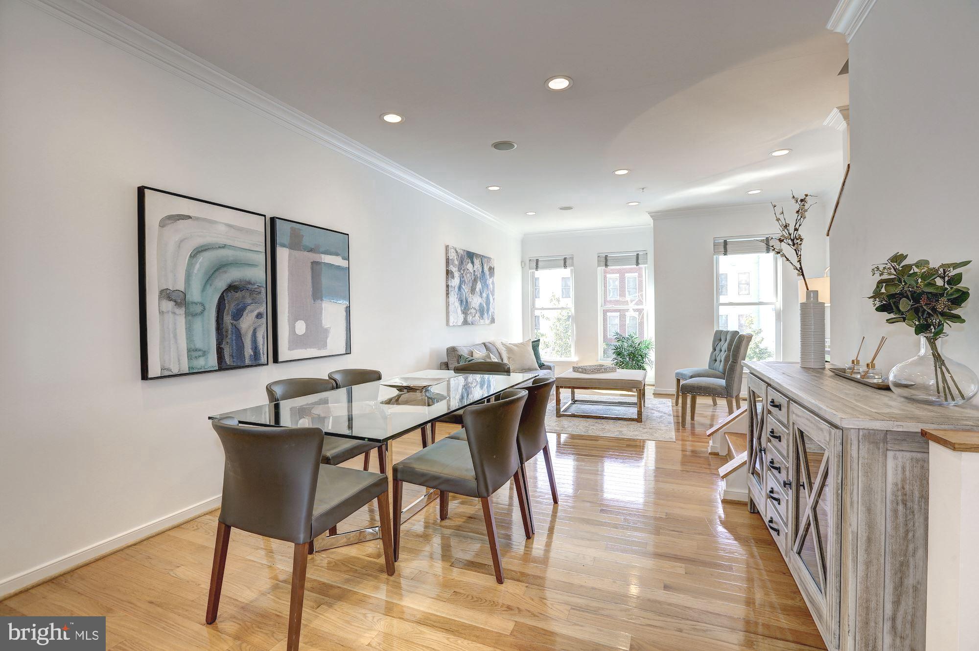 410 L Street Southeast Washington, DC 20003 - Photo 11 of 35 a dining room with furniture and wooden floor