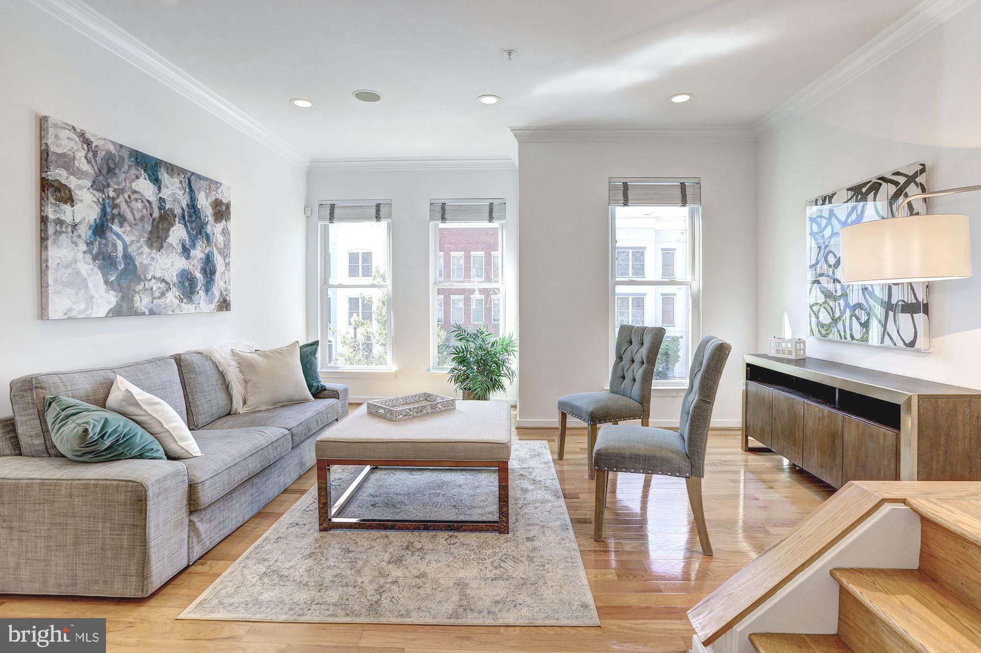 410 L Street Southeast Washington, DC 20003 - Photo 14 of 35 a living room with furniture and a large window