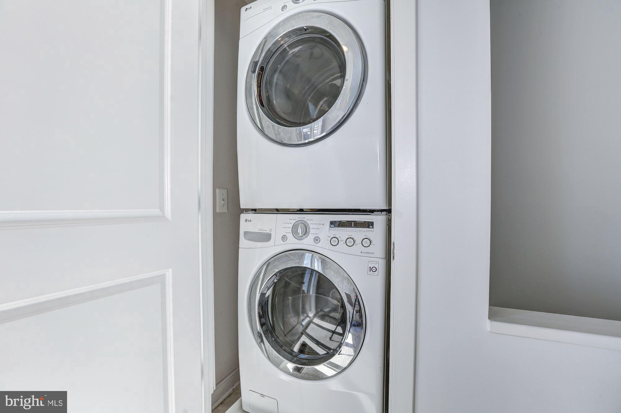 410 L Street Southeast Washington, DC 20003 - Photo 24 of 35 a view of a hallway with washer and dryer