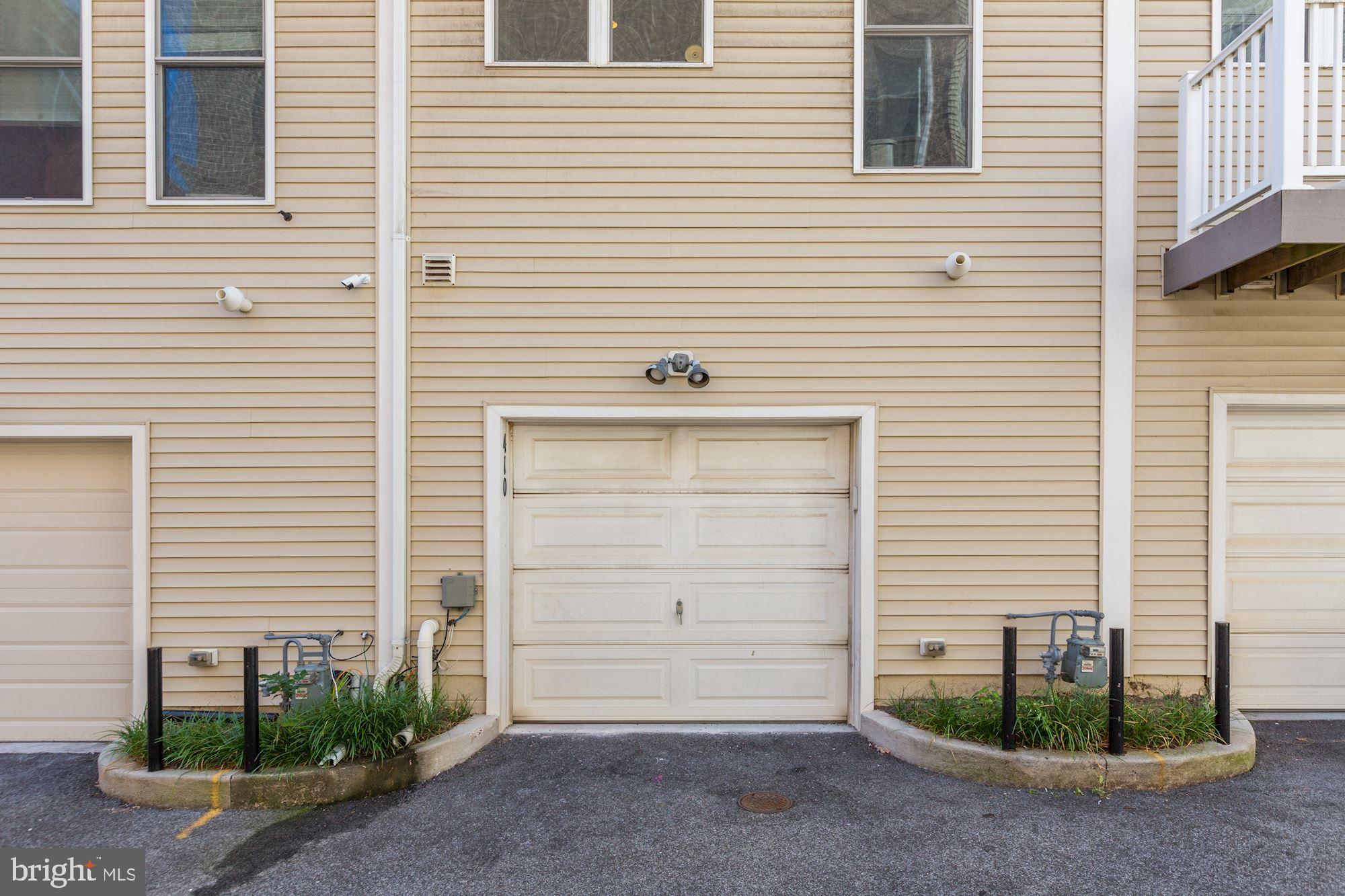 410 L Street Southeast Washington, DC 20003 - Photo 29 of 35 a front view of a house with garage