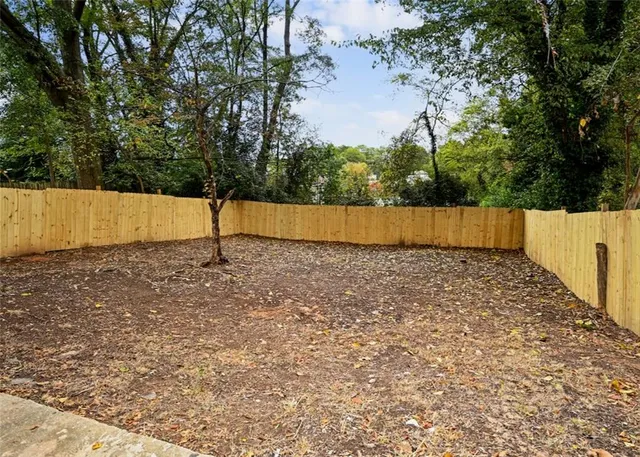 a house with trees in the background