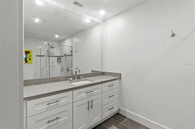 a view of a hallway with mirror