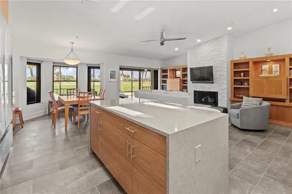 a kitchen with stainless steel appliances granite countertop a stove and a sink