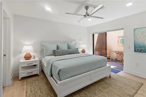 a view of washer and dryer with kitchen in the background