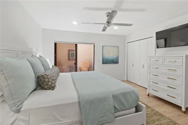 a view of a patio with a table chairs and a patio