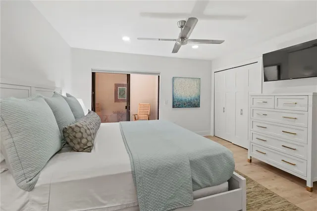 a view of a patio with a table chairs and a patio