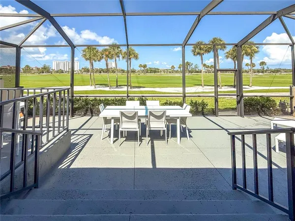 a view of a park with large trees