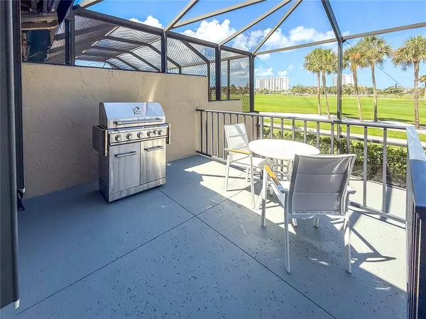 a view of a house with a big yard plants and large trees