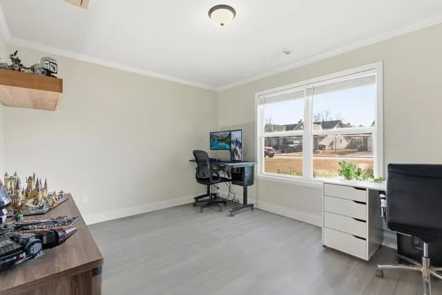 a room with furniture and a window