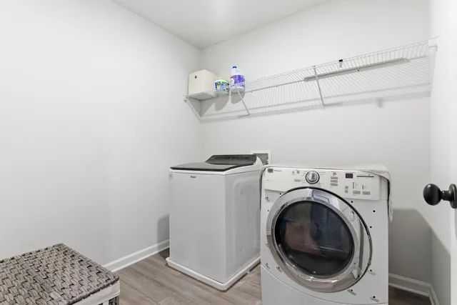 a utility room with dryer and washer