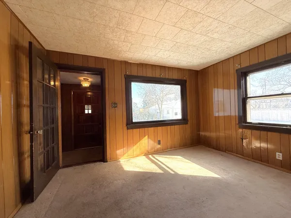 an empty room with windows