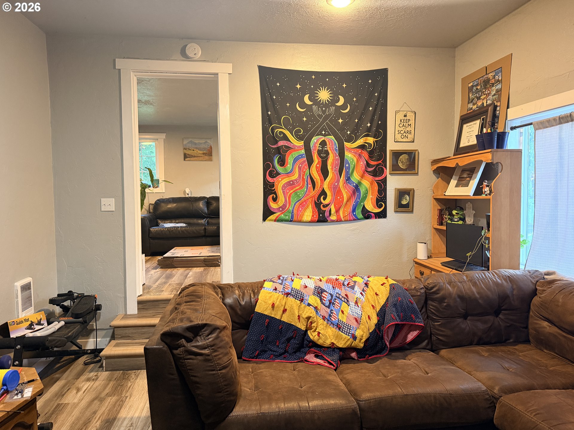 677 Southeast Moffitt Road Waldport, OR 97394 - Photo 12 of 36 a living room with furniture and a couch