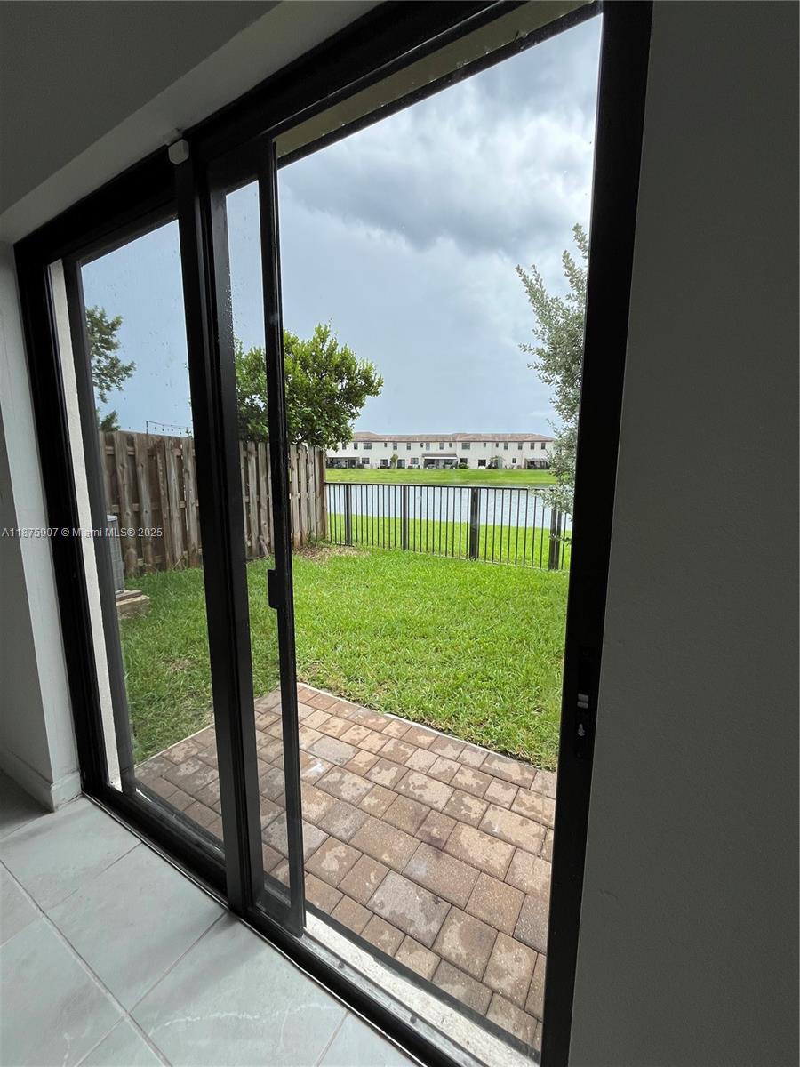 10008 Southwest 228th Terrace Miami, FL 33190 - Photo 16 of 46 a view of backyard from window