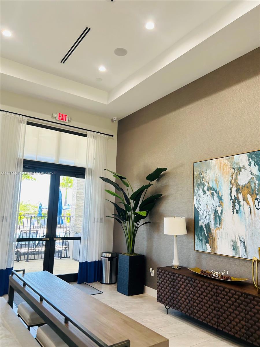 10008 Southwest 228th Terrace Miami, FL 33190 - Photo 37 of 46 a living room with furniture