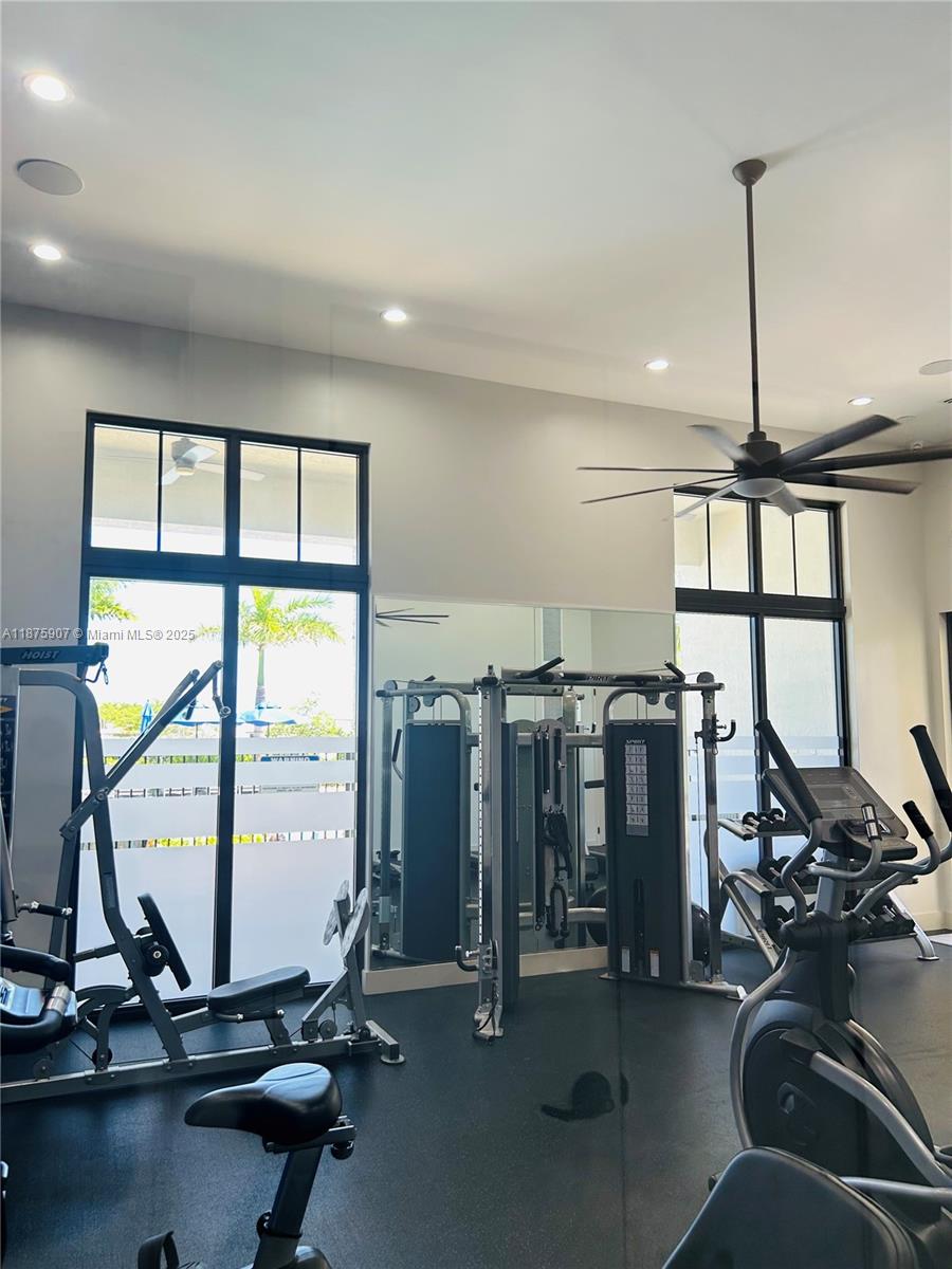 10008 Southwest 228th Terrace Miami, FL 33190 - Photo 42 of 46 a view of a room with gym equipment