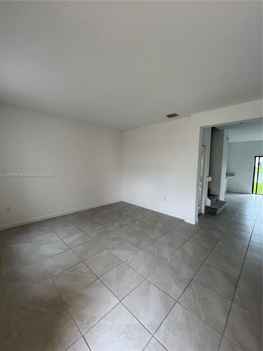 10008 Southwest 228th Terrace Miami, FL 33190 - Photo 5 of 46 a view of empty room