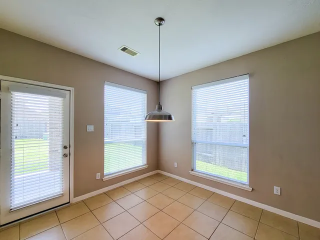 a bathroom with a sink toilet and a mirror