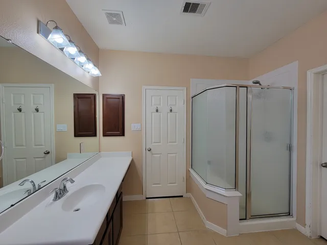 a view of swimming pool with a yard