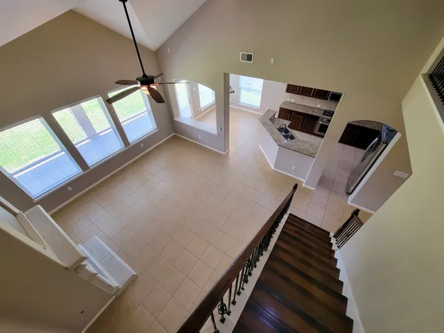 a view of entryway and hall with a front door