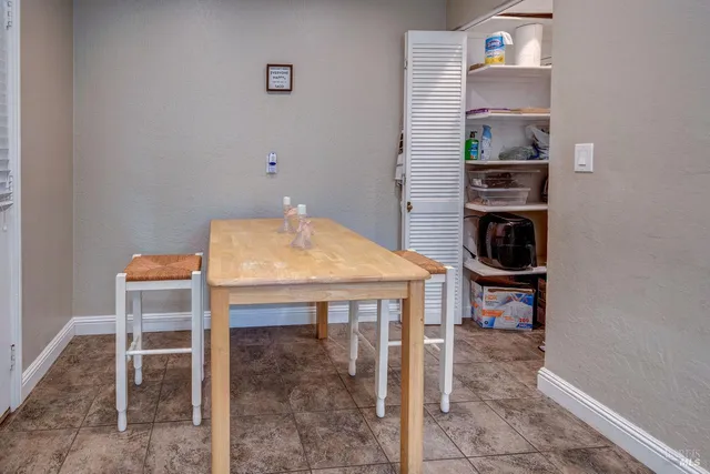 a table and chairs in a room