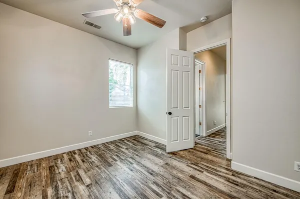 a bed room with a bed and a couch