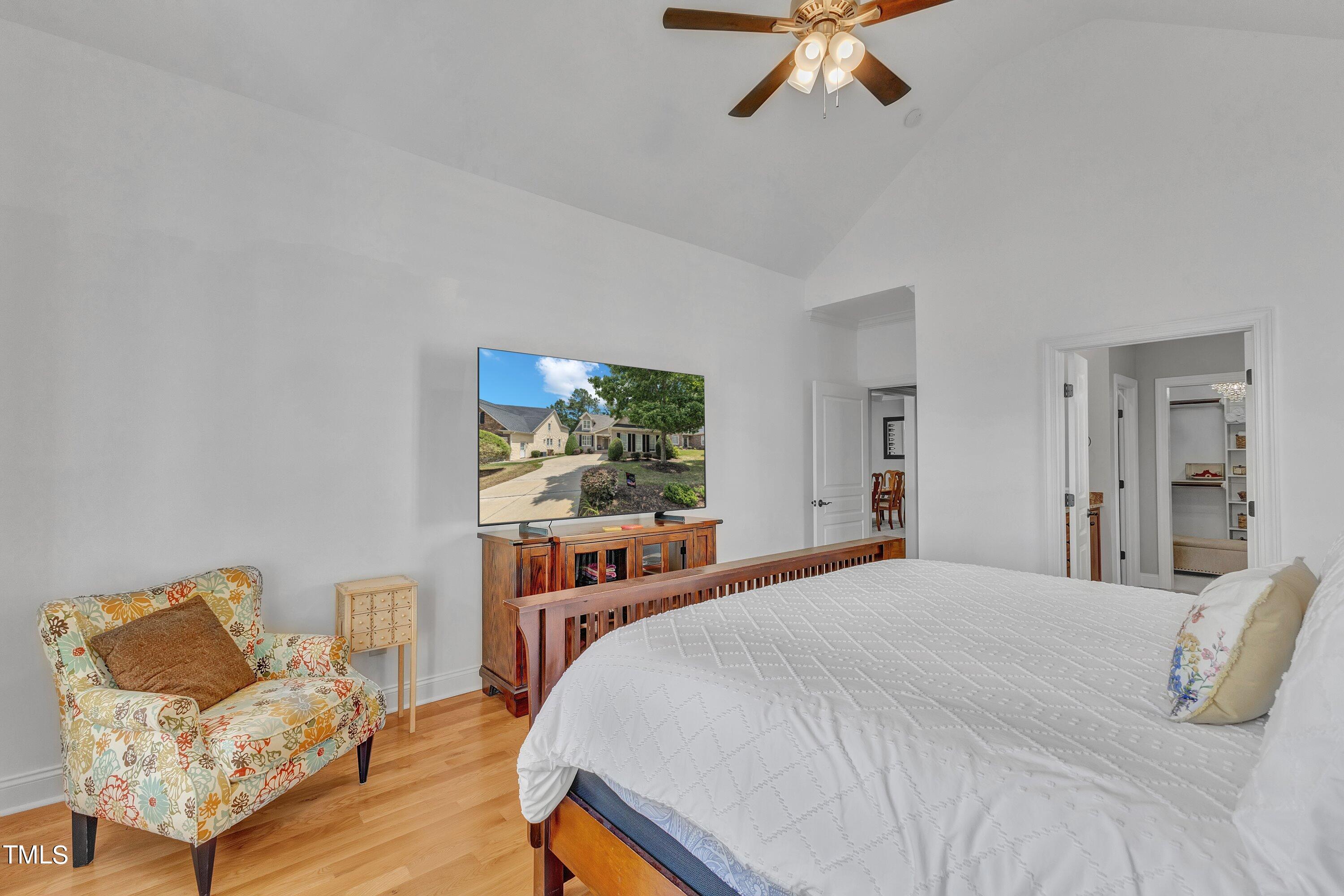 1741 Dunn Maple Drive Wake Forest, NC 27587 - Photo 28 of 63 a bedroom with a bed and a couch