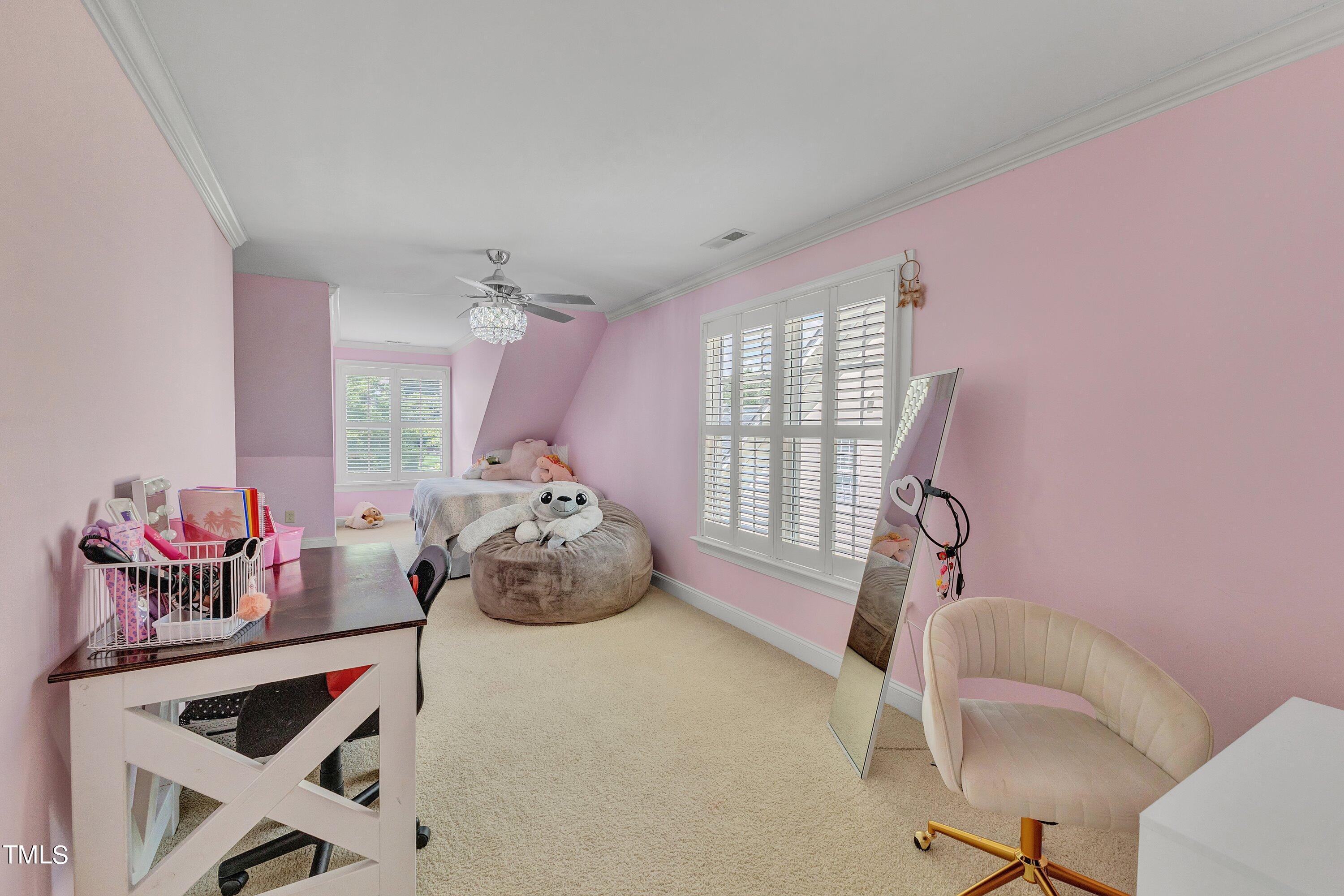 1741 Dunn Maple Drive Wake Forest, NC 27587 - Photo 34 of 63 a bedroom with furniture and a large window