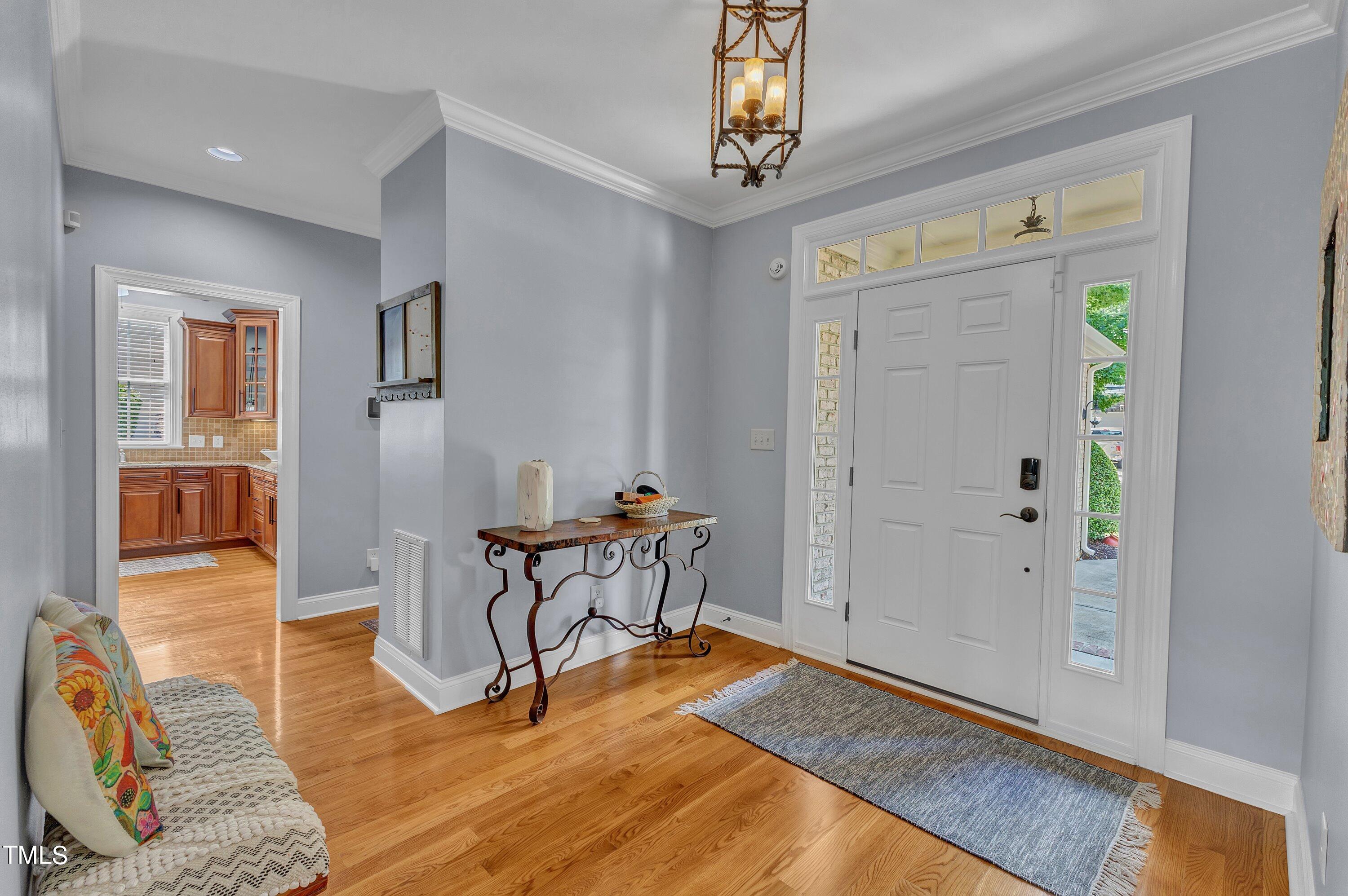 1741 Dunn Maple Drive Wake Forest, NC 27587 - Photo 4 of 63 a view of a livingroom with furniture and wooden floor