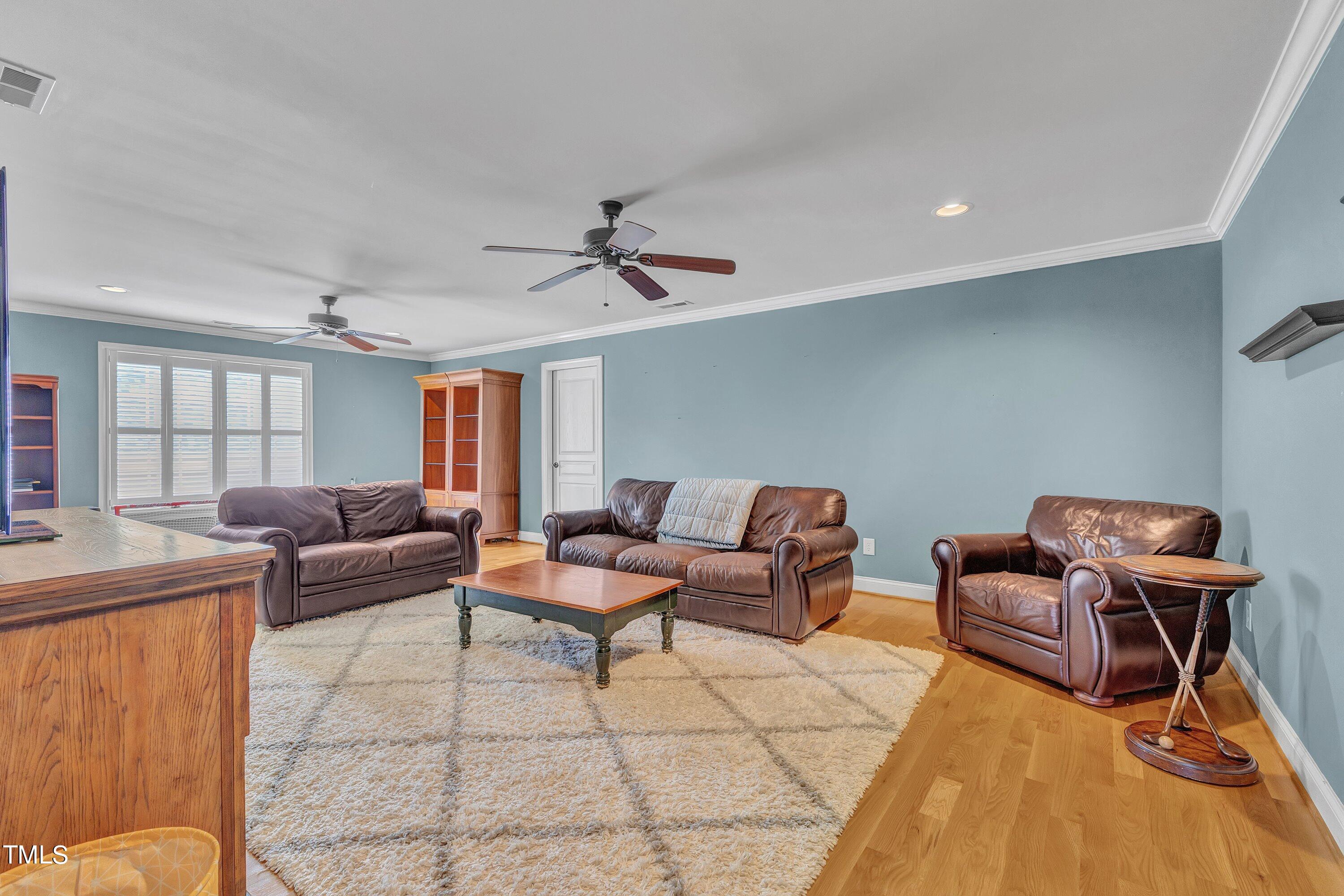 1741 Dunn Maple Drive Wake Forest, NC 27587 - Photo 41 of 63 a living room with furniture and a window