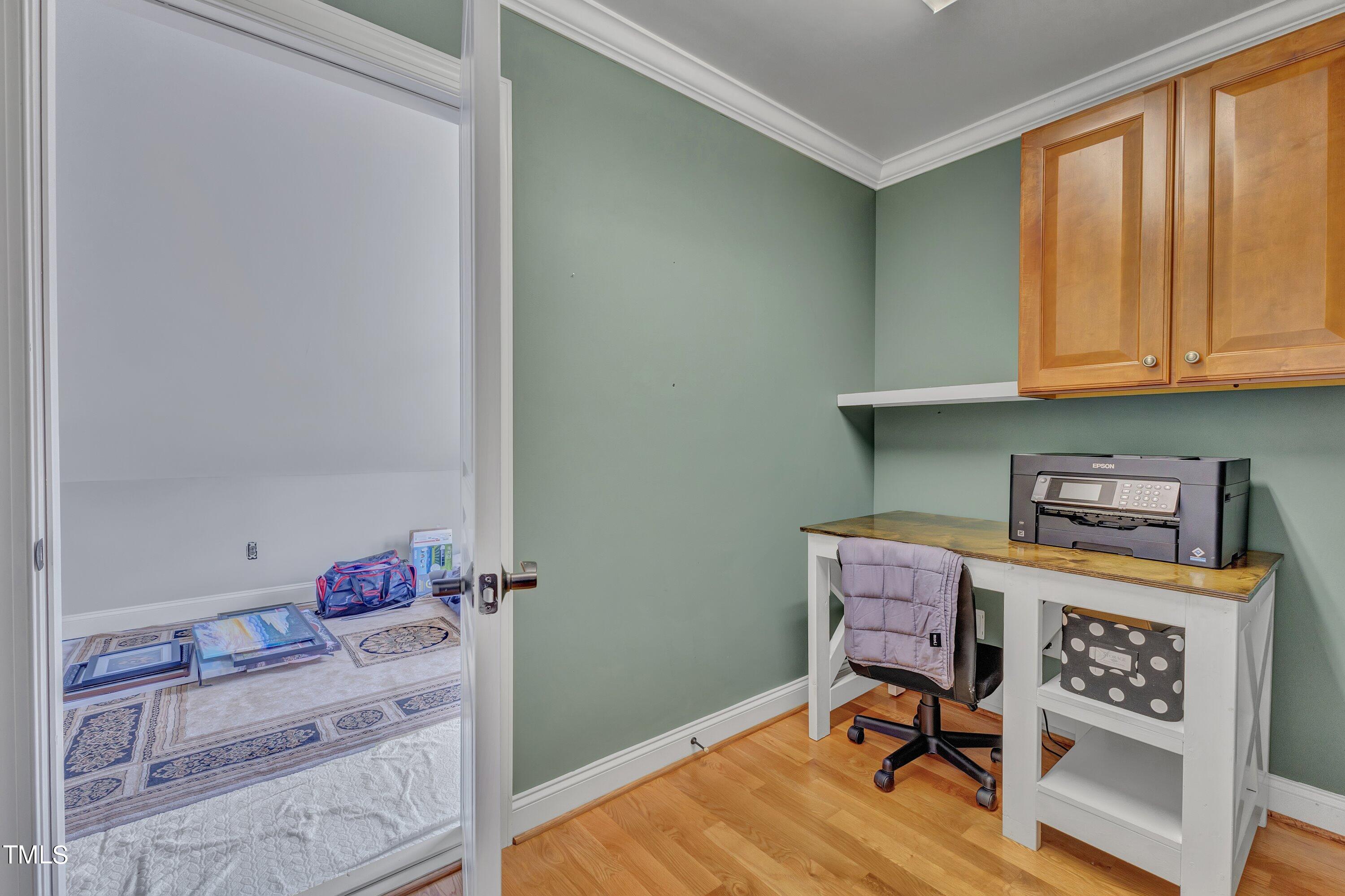 1741 Dunn Maple Drive Wake Forest, NC 27587 - Photo 44 of 63 a workspace with furniture and a window