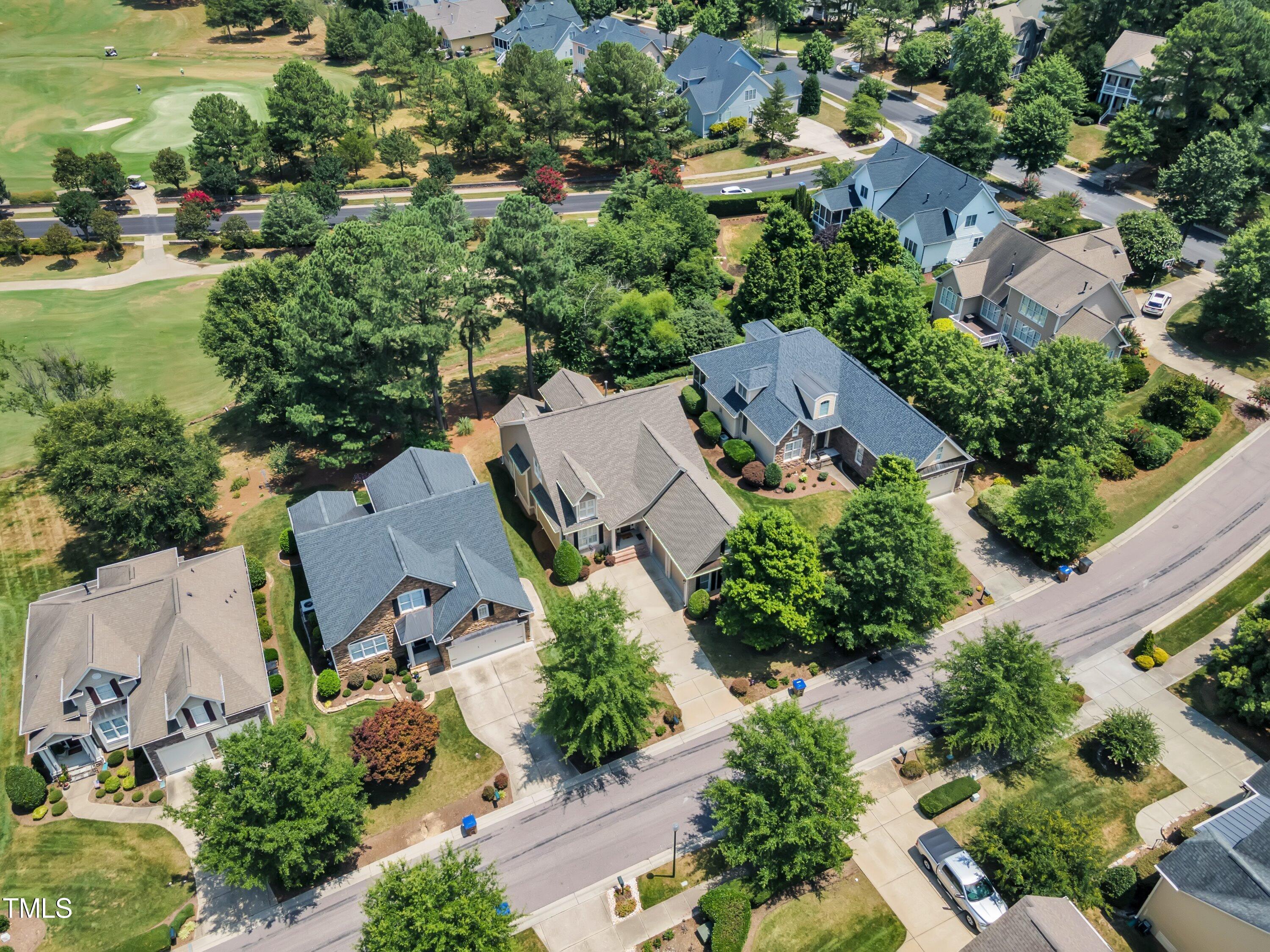 1741 Dunn Maple Drive Wake Forest, NC 27587 - Photo 55 of 63 an aerial view of a houses with outdoor space and swimming pool