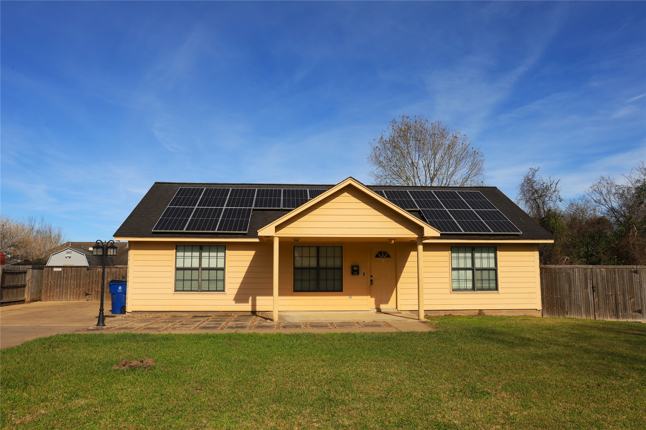 218 Hickory Street Sweeny, TX 77480 - Photo 2 of 13 a front view of a house with a yard