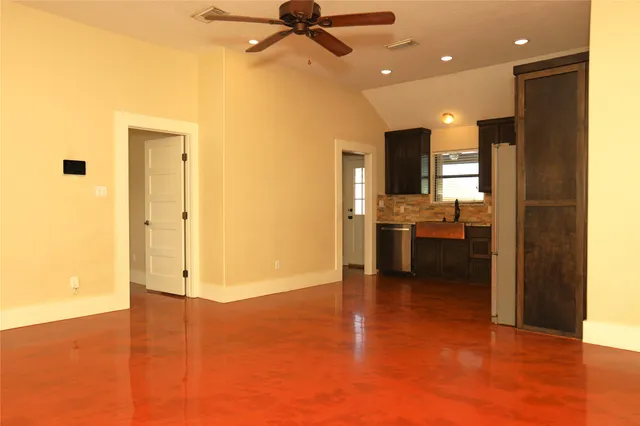 a view of a living room with a flat screen tv