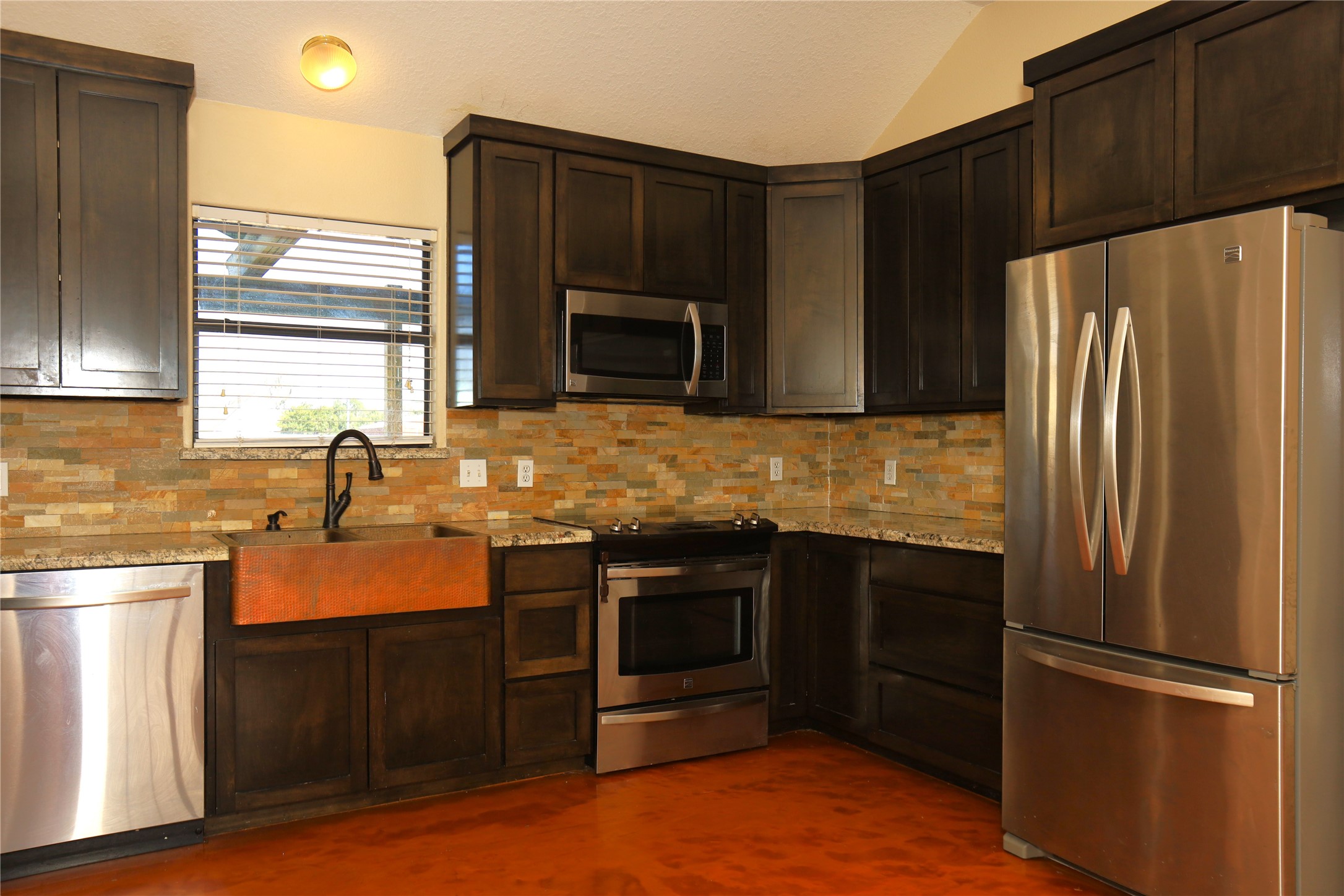 218 Hickory Street Sweeny, TX 77480 - Photo 5 of 13 a kitchen with granite countertop a refrigerator stove and sink