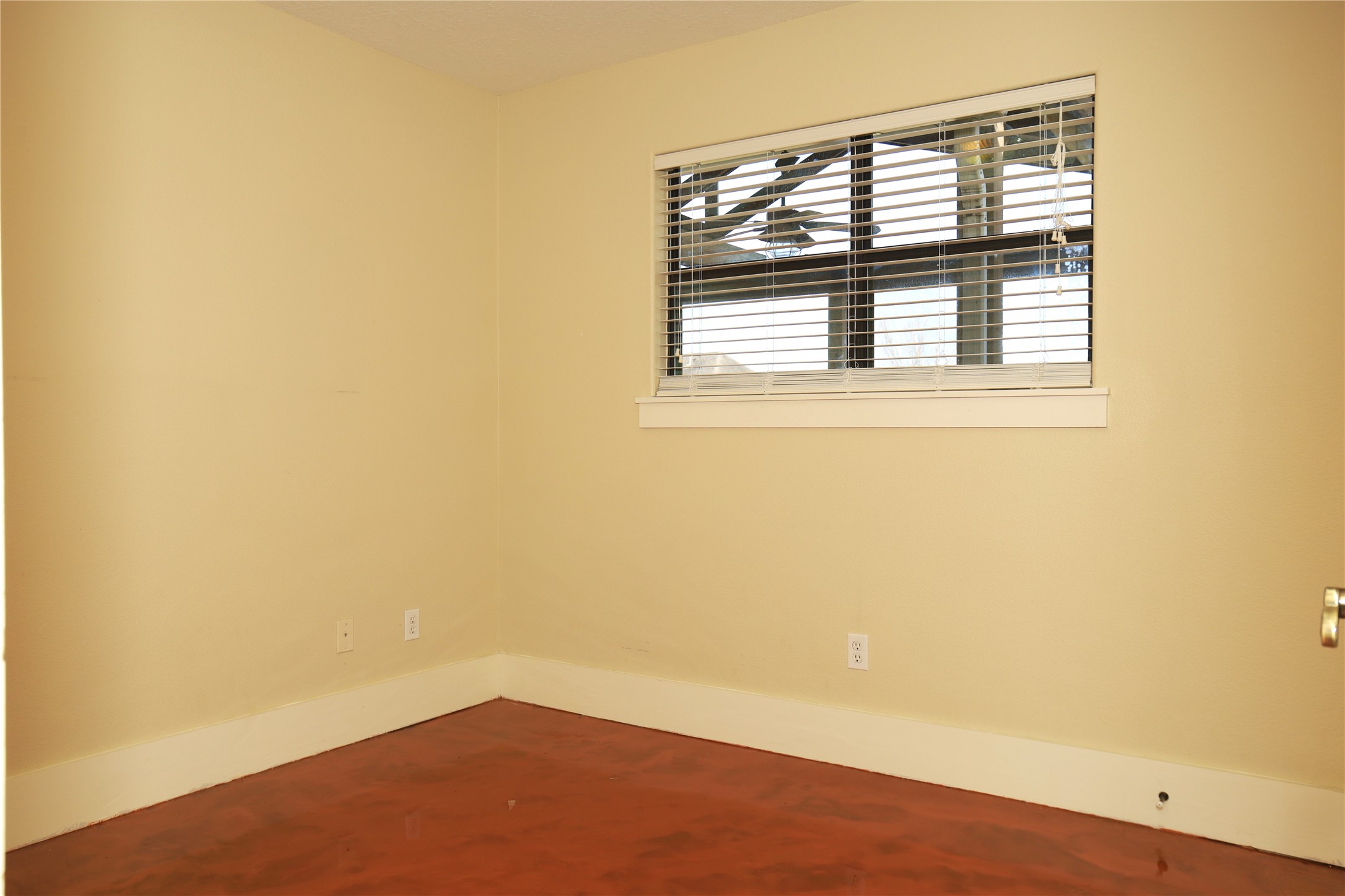 218 Hickory Street Sweeny, TX 77480 - Photo 9 of 13 a view of empty room with wooden floor and fan
