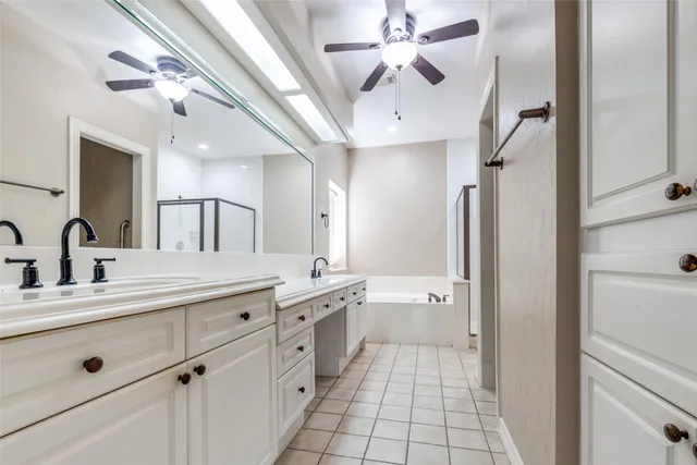 a bathroom with a sink a vanity and a mirror