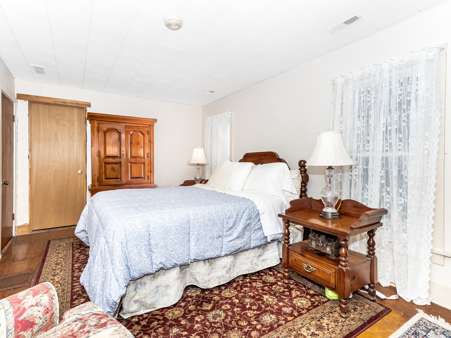 13561 West Kennedy Road Manhattan, IL 60442 - Photo 12 of 28 a bedroom with bed and a window